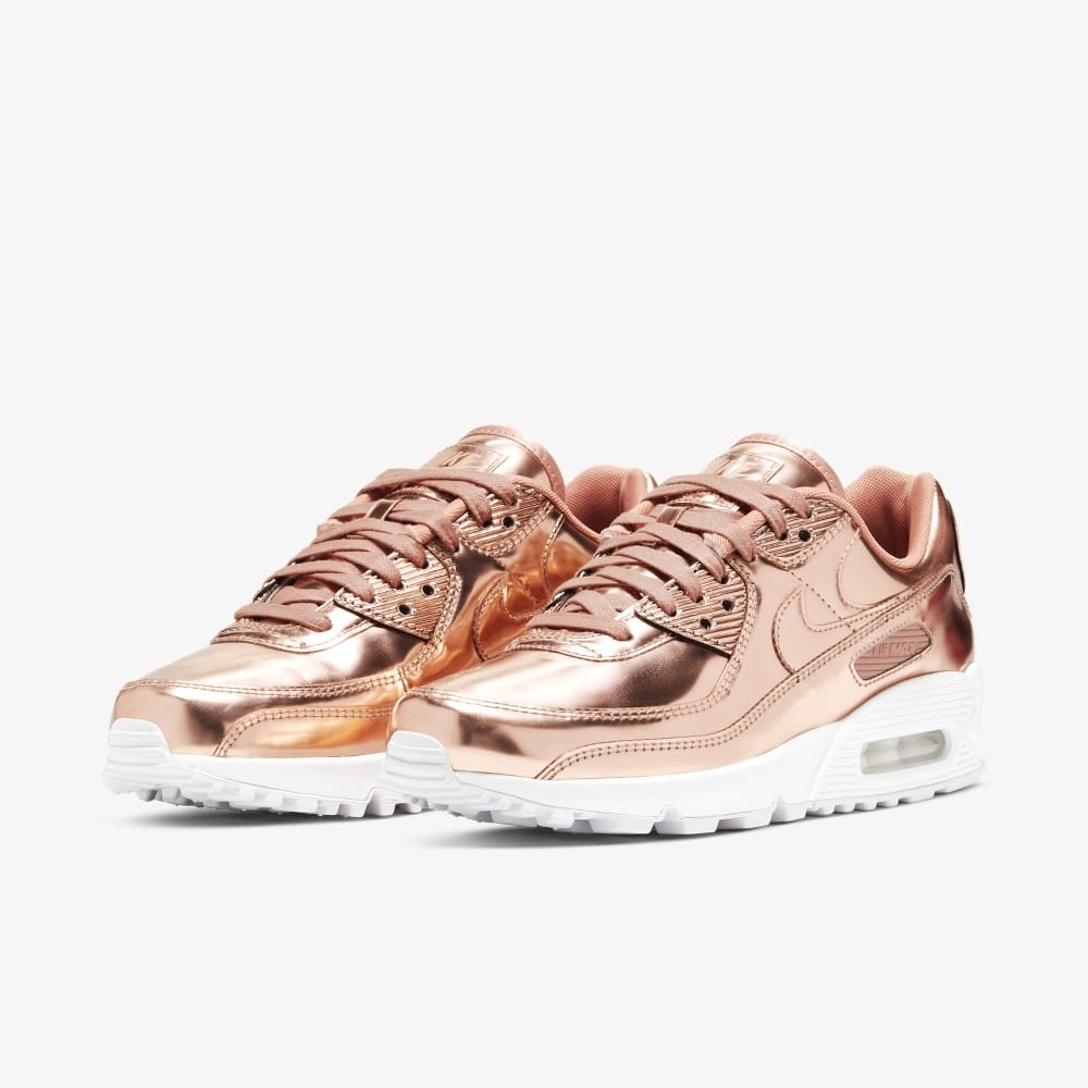 Rose on sale gold nikes